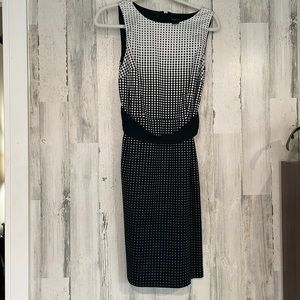 Ann Taylor size 6 black and white dress. Top has small dots and black bottom.